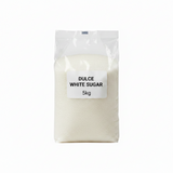 Bag of Dulce White Sugar with a label indicating weight on a white background